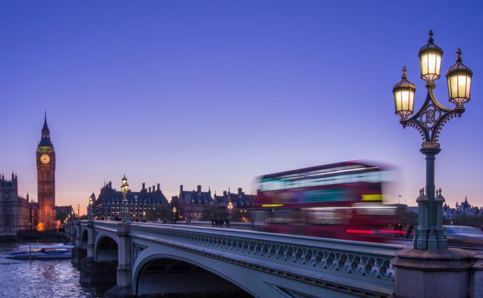 Red,Double-decker,Bus,Crosses,Westminster,Bridge,At,Dusk,With,Big